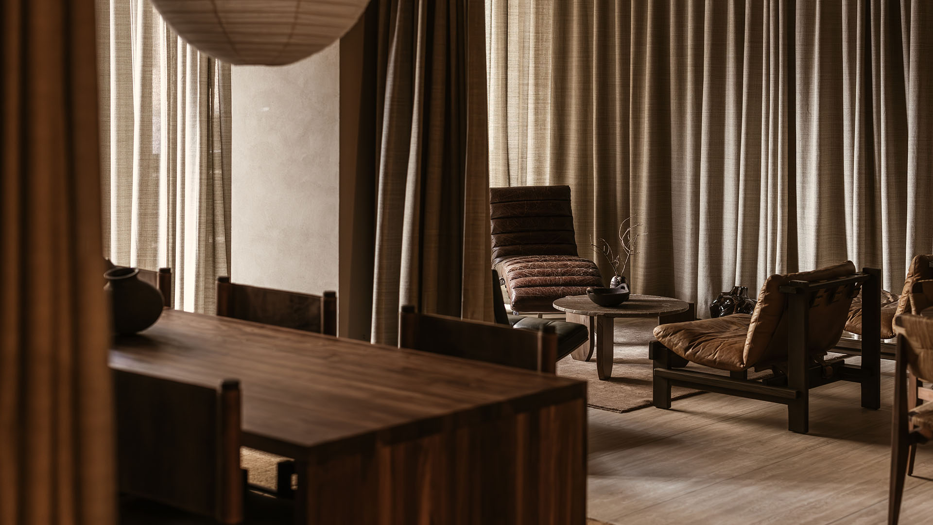 Casa Collective hotel interior with natural materials, soft light and calm atmosphere
